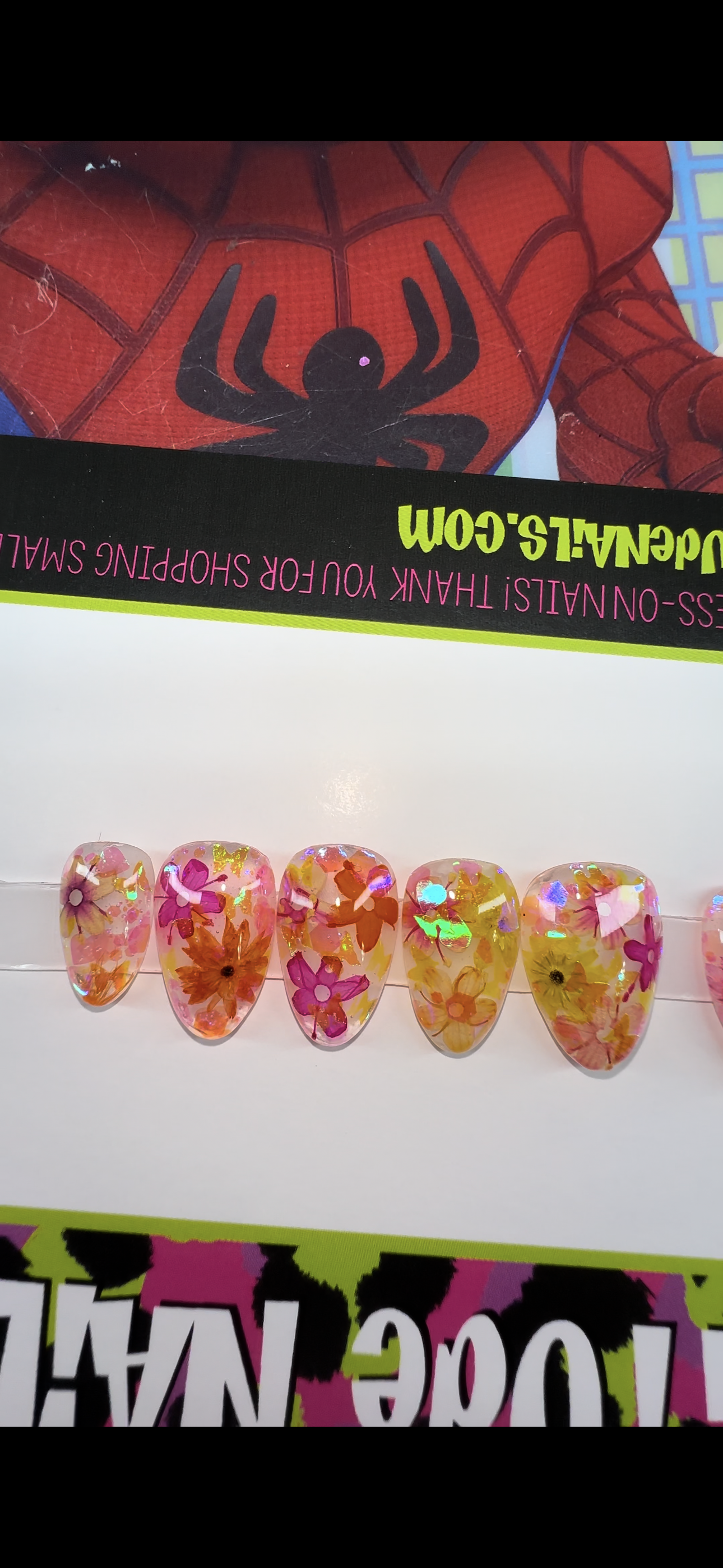 Shiny flowers (real flowers encapsulated in gel with holographic glitter)