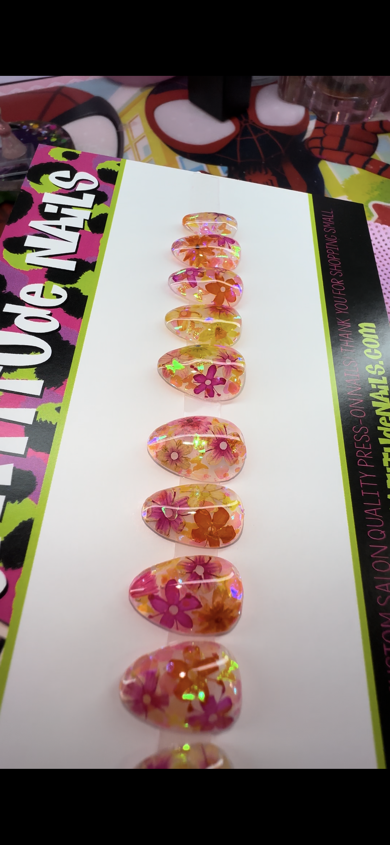 Shiny flowers (real flowers encapsulated in gel with holographic glitter)