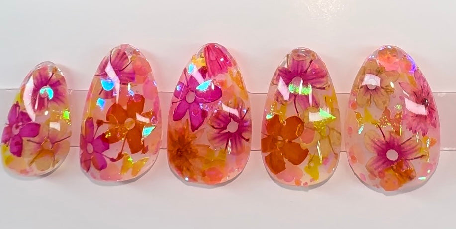 Shiny flowers (real flowers encapsulated in gel with holographic glitter)