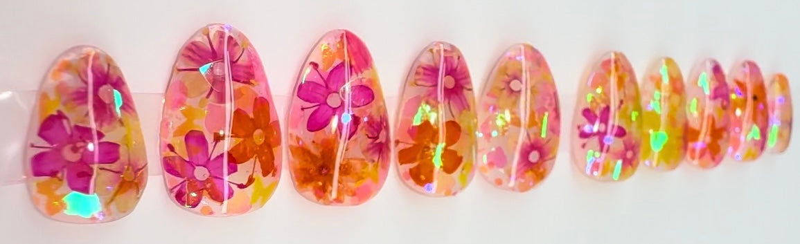 Shiny flowers (real flowers encapsulated in gel with holographic glitter)