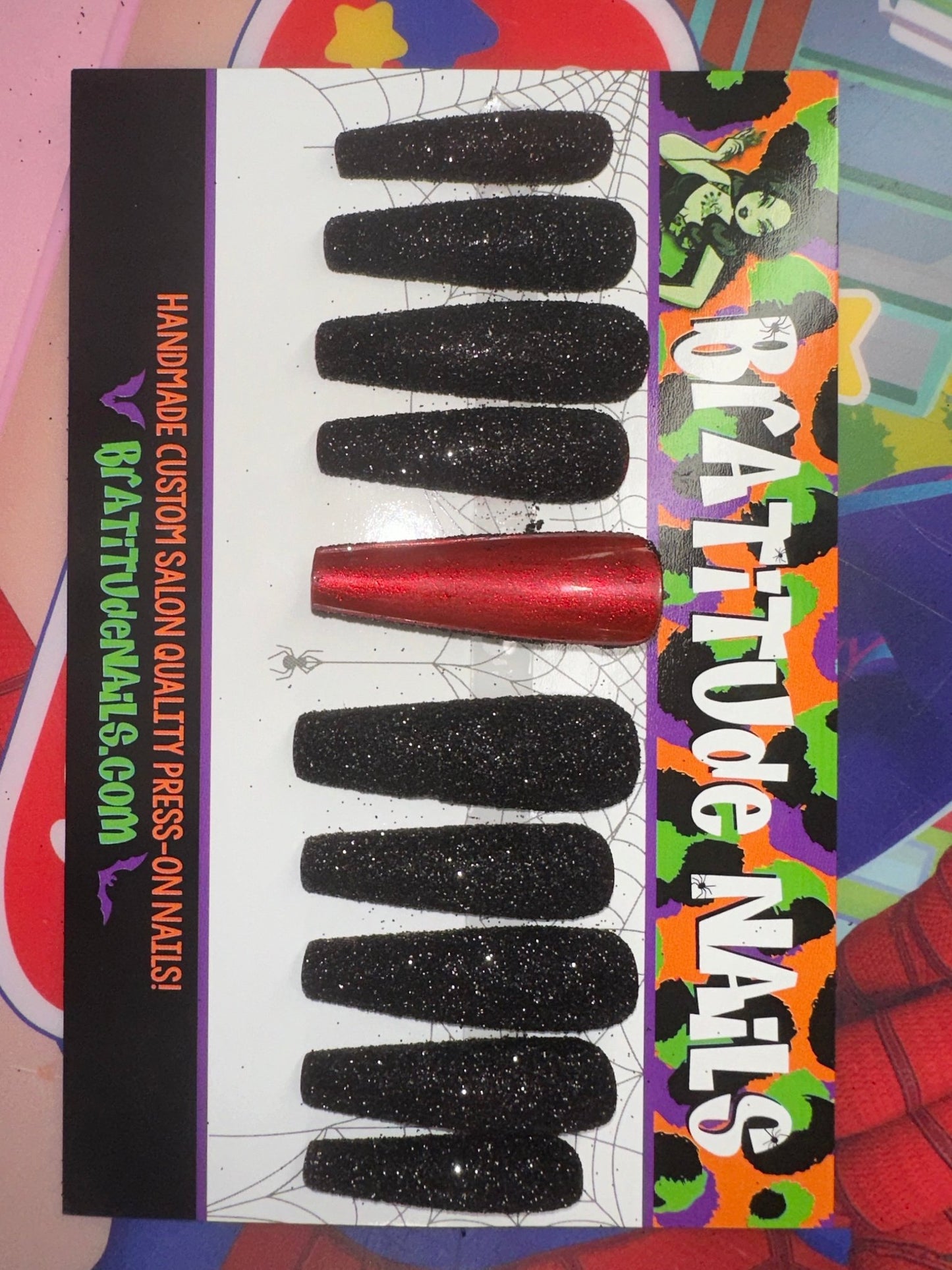 Black glitter nails with red silk underneaths (Gel)