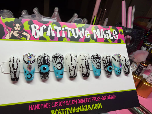Wicked eyes with rhinestones