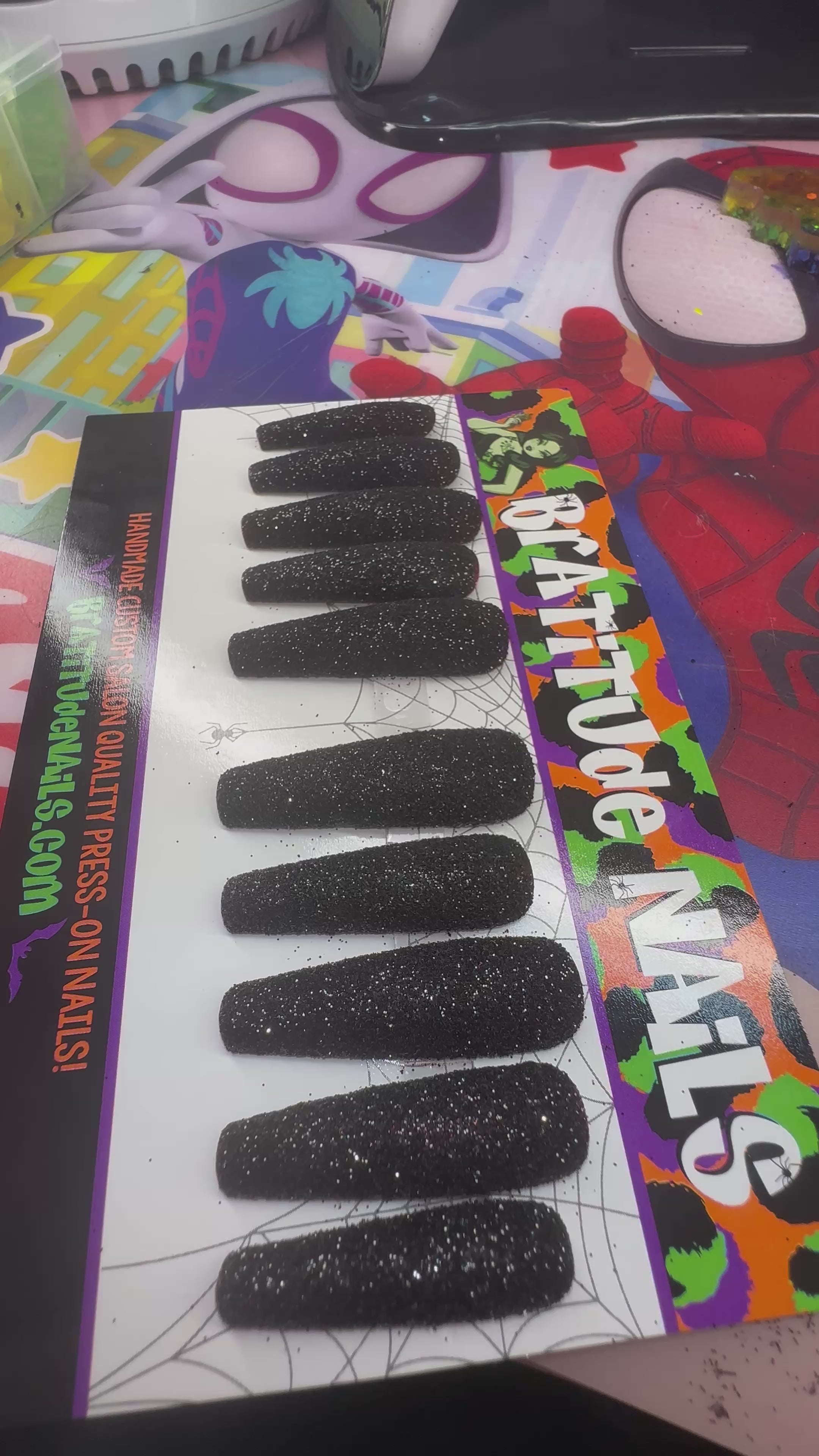 Black glitter nails with red silk underneaths (Gel) – Fem